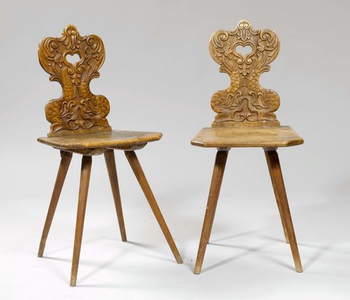 PAIR OF CARVED STABELLE CHAIRS, Baroque style, from the Alpine region. Walnut and oak, carved with dolphins.