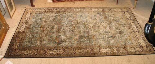 GHOM SILK RUG old.Turquoise central field with trees and animals in beige and white. The dark border with white cartouches. Good condition, 210x135 cm.