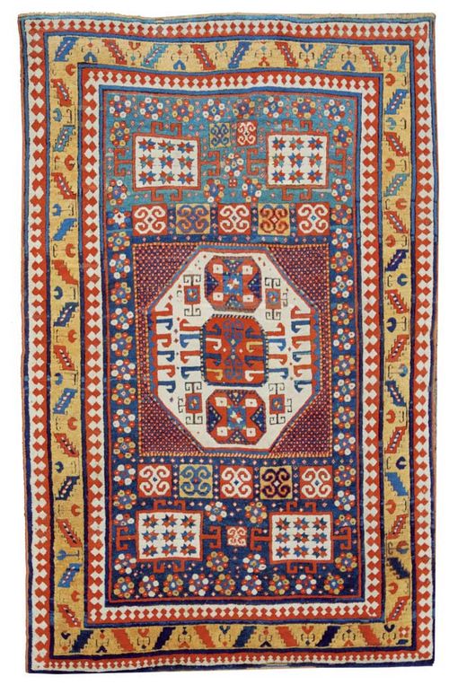 KARATCHOPH antique.Attractive collector's piece in good condition.  Tall pile, the central field in green, red and blue, with typical patterning, with yellow border. 220x145 cm.
