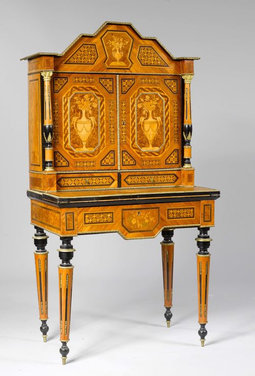 BONHEUR DU JOUR, Napoleon III. Tulipwood and maple grain, and different other woods richly inlaid as geometrical reserves, vases and a music medallion. Body with drawer. Top with double-doors over 2 drawers. Lower part  with hinged writing surface lined with leather. Brass mounts and friezes. 82x50(72)x156 cm. 1 key.