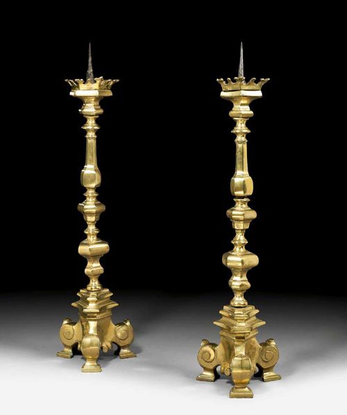 PAIR OF CANDLE HOLDERS,Baroque, probably  German, 18th century Bronze. With baluster shaft and lavishly scrolled tripod base. H 62 cm. Provenance: Private collection Zurich
