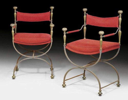 PAIR OF ARMCHAIRS, known as "faldistorium",Renaissance style, Florence, 19th century Iron and chased brass. Rectangular seat on shaped cross stretcher with ball feet. The flat backrest with spheres at the angles and armrests on corresponding supports. With red fabric covers. 52x40x56x97 cm.