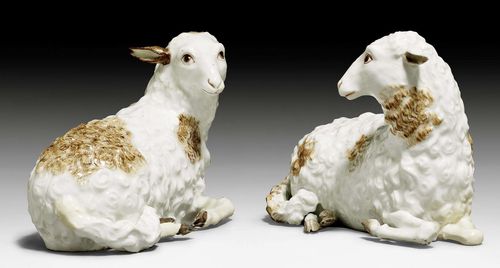 TWO RECLINING SHEEP, IN THE STYLE OF MEISSEN, LATE 18TH CENTURY.After a model by J.J. Kaendler. Without marks. L 17cm, H 12.5cm. Restorations. (2)