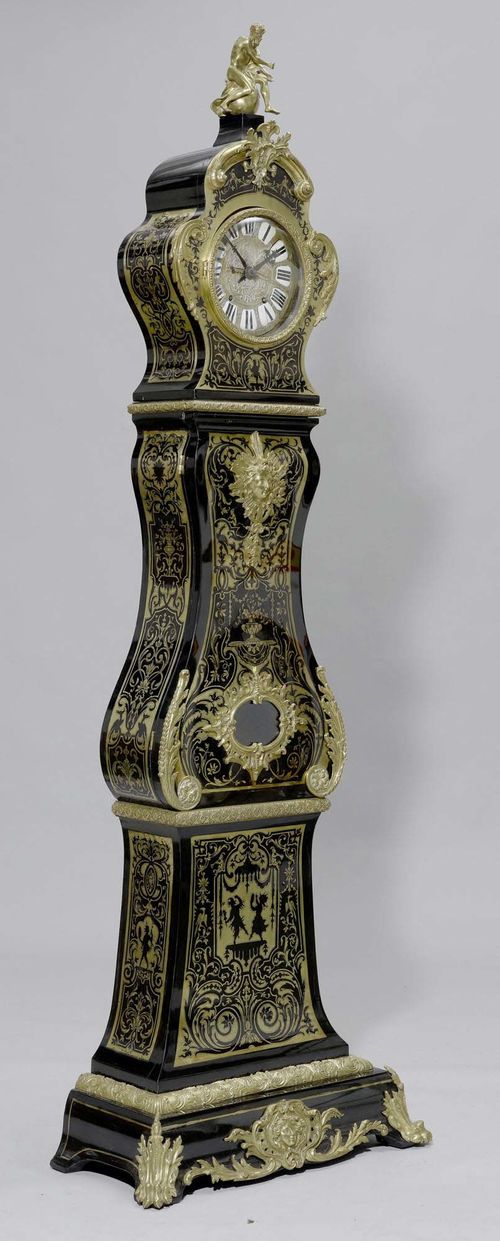 A LONGCASE CLOCK WITH BOULLE MARQUETRY, Napoléon III, France. Black lacquered wood with rich inlays and bronze mounts. Bronze dial with enamel cartouches. Comptoise movement with anchor escapement striking on bell. H 230 cm.
