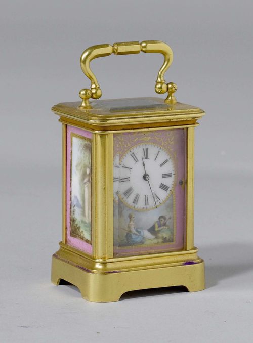 A SMALL TRAVEL CLOCK WITH PORCELAIN PLAQUES, France, 19th century. Brass case with painted porcelain plaques. Movement with spring winding. H 8 cm. Leather case.