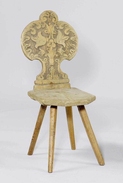 A RUSTIC CHAIR, Alpine region, 19th century. Carved pine.