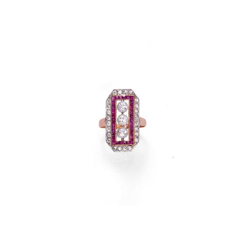 DIAMOND AND "RUBY" RING. Platinum over yellow gold. Elegant ring in the Art Déco style, the octagonal top set with 3 old European cut diamonds weighing ca. 0.45 ct, within a double border of numerous synthetic square-cut rubies and 24 single-cut diamonds weighing ca. 0.40 ct. Shank not original. Size ca. 53.