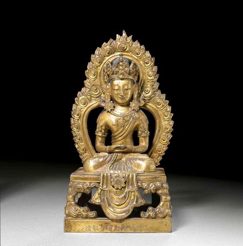 AMITHAYUS.Sino-Tibetan, Qianlong-mark and from the period, H 20.5 cm. Gilt copper alloy. The vessel for the elixir of life is missing. Qianlong mark and date on plinth 1769.