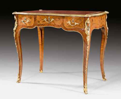 SMALL BUREAU PLAT "A FLEURS", Louis XV, in the style of H. HANSEN (Hubert Hansen, maitre 1747), Paris circa 1755. Tulipwood, rosewood, and partly dyed precious woods in veneer and finely inlaid with flowers, leaves and decorative frieze. Top lined with gold-stamped, red leather and edged in bronze. The front with broad central drawer, flanked on each side by 1 drawer. Fine, matte and polished gilt bronze mounts and sabots. 87x56x77 cm.