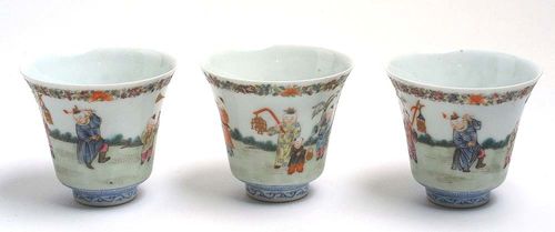 SET OF THREE CUPS.China, Republic, H 7 cm. Finely decorated with motif of children playing in polychrome enamel colours. Iron red mark on the foot "liu zhi cheng xiang". (3)