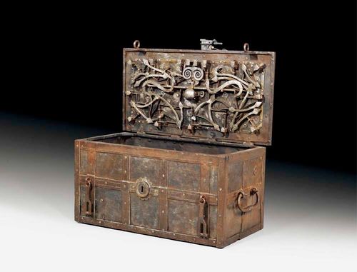 LARGE IRON COFFER, Renaissance, German circa 1680. Wrought iron. With overhanging lid and compartment, finely engraved iron lock and ornamental bands. 97x50x46 cm. Provenance: Château de Vincy, West Switzerland.