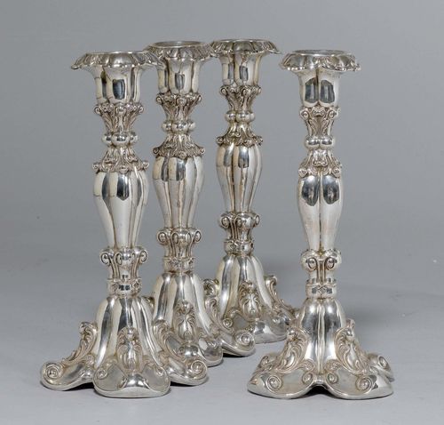 4 CANDLESTICKS,20th century. In the Baroque style. H: 22.5 cm.