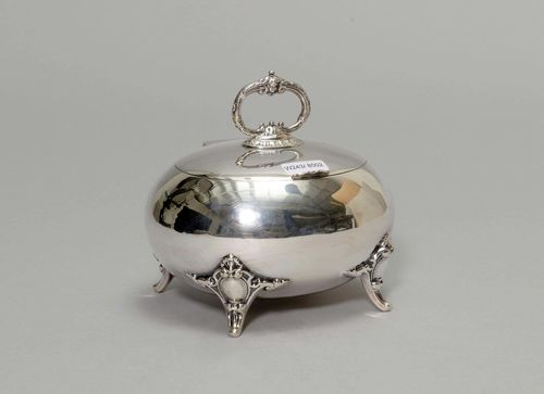 SUGAR BOWL,Germany, 19th/20th century. With maker's mark. Flattened egg shape on four feet. Hinged cover with matching round handle. The inside gilt. L ca. 14.5 cm, 285 g.