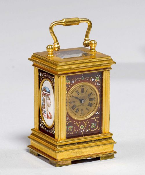 SMALL TRAVEL CLOCK,Italy, ca. 1890. The dial indistinctly signed ... PADRE E FIGLI. Rectangular brass case with handle, the sides and front with enamelled tendrils and portraits. Brass dial. Movement with balance. 4x3.5x4.5 cm. In a case lined with red velour. 1 key.