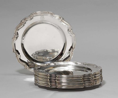 SERIES OF 12 PLATES,Germany, late 19th century. Maker's mark: Gebrüder Friedländer. Curved, rounded form with volute rim. D 24.5 cm, total weight 5000 g.