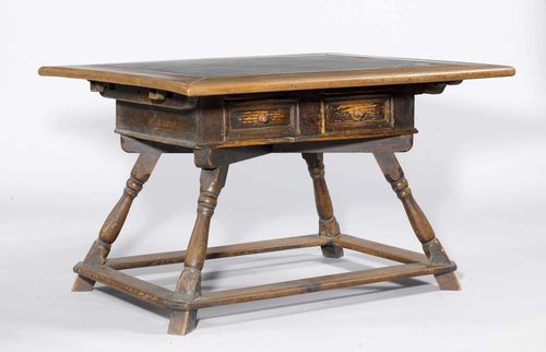 SLATE TABLE,Baroque, from the Alpine region. Walnut, beech and pinewood, stained dark. Rectangular top with slate centre (defective). Two drawers. Turned legs, interconnected. 119x96x73 cm. 2 later extensions, L 45 cm.