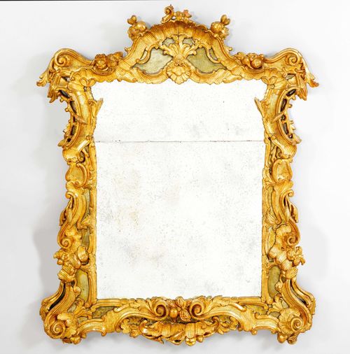 MIRROR,in the Baroque style, Italy, 19th century. Wood, carved with leaves, cartouches, scrolls and rocailles, and gilt and painted. Rectangular frame with rocailles top. H 126 cm, W 106 cm. Top, incomplete.