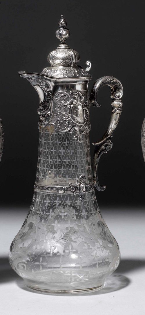 CARAFE WITH HANDLE,Russia, late 19th century. Cut glass with silver mount. H 31.5 cm.
