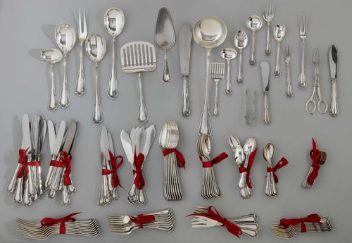 CUTLERY SET,Switzerland, 20th century. Manufactory Jezler. "Châtelaine" pattern. Comprising: 8 spoons, 8 forks, 8 knives, 8 dessert spoons, 8 dessert forks, 8 dessert knives, 8 coffee spoons, 8 mocha spoons, 6 cream spoons, 6 fish forks, 6 fish knives, 8 cake forks, 5 fruit knives, various serving utensils. Total weight (excl. knives) 4950 g.