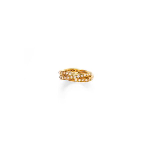 DIAMOND AND GOLD RING. Yellow gold 750. Decorative triple ring, set throughout with 54 brilliant-cut diamonds weighing ca. 1.00 ct. Size ca. 53.