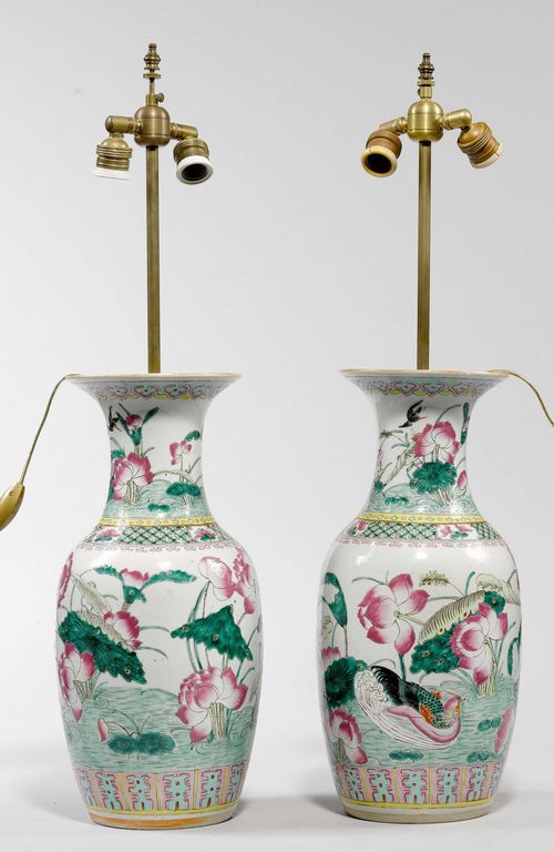 PAIR OF "FAMILLE ROSE" VASES AS TABLE LAMPS,China, late 19th century. Porcelain, polychrome painted. H 79 cm.