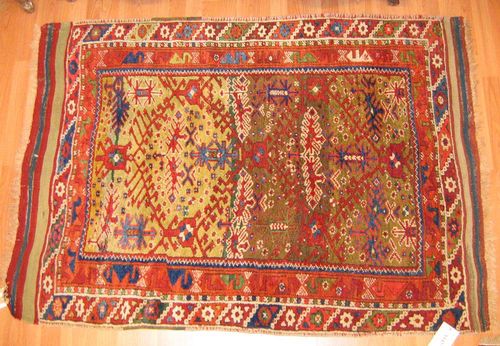 DOESCHMALTE antique.Red and green central field with stylised plant motifs, stepped border, good condition, 140x116 cm.