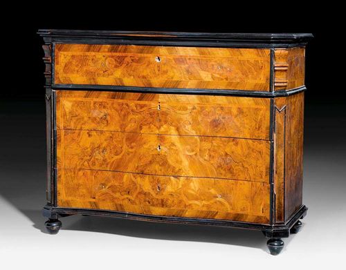 CHEST OF DRAWERS,early Baroque, Northern Italy circa 1650/70. Walnut and burlwood veneer, also ebonised wood. With shaped front and 4 drawers, the lower 3 being sans traverse. Requires some restoration. 135x58x106 cm. Provenance: private collection, Germany