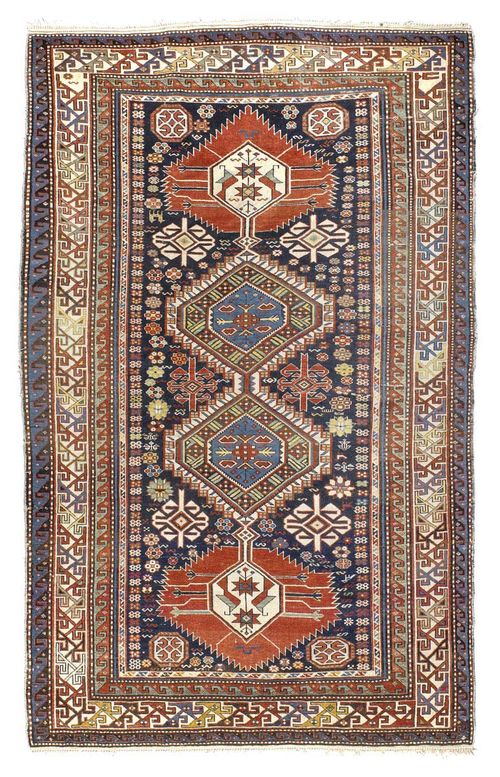 SHIRVAN KAPISTAN antique. Dark blue central field with four medallions, patterned with star motifs, white border, signs of wear, 238x148 cm.