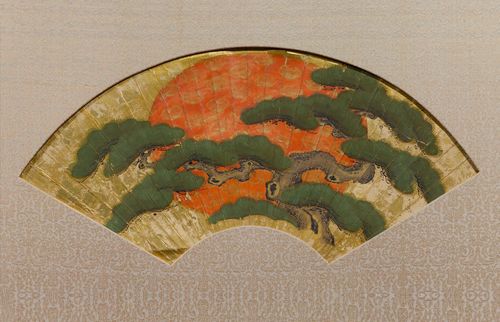 A FAN PICTURE OF A PINE TREE AND RED SUN ON A GOLD GROUND. Japan, Edo period, 36x66 cm. Gold and colours on paper. Framed.