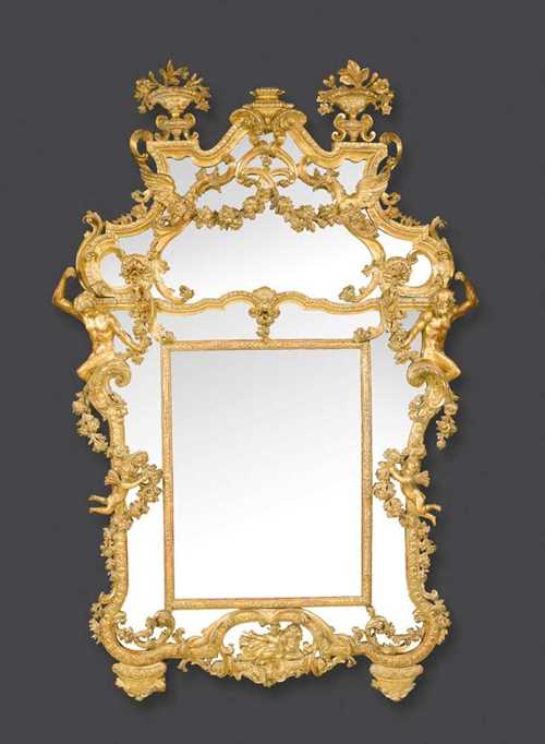 PAIR OF IMPORTANT MIRRORS WITH PUTTI,Baroque, Rome or Florence, 18th century Pierced and finely carved with putti, cartouches, leaves and frieze. With cut glass mirror plates. H 230 cm, W 148 cm. Provenance: from an English collection.