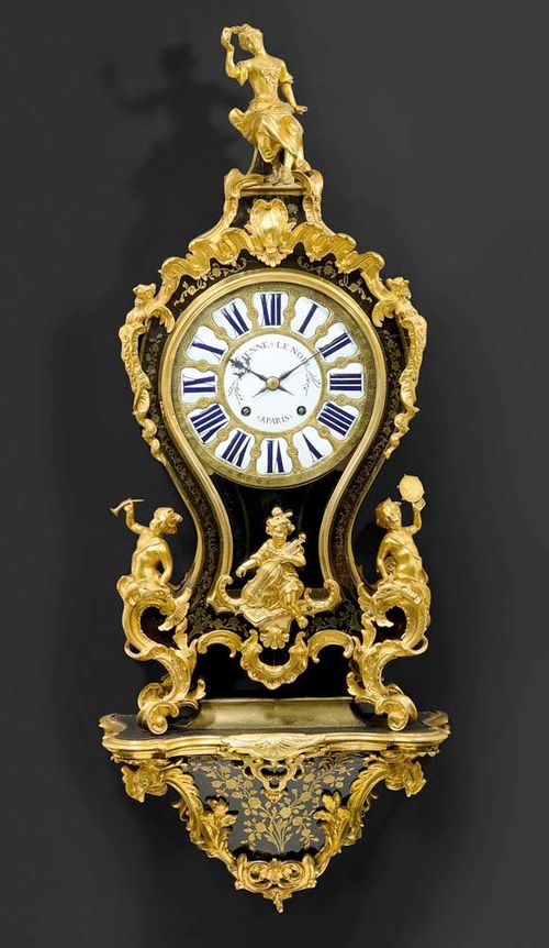 IMPORTANT BOULLE CLOCK "AUX ENFANTS" with plinth,Louis XV, the dial and movement signed ETIENNE LE NOIR A PAIR (Etienne II Lenoir, maitre 1717), the case and the bronzes from a Paris master workshop and with "c couronné", Paris circa 1730/40. The case with brown tortoiseshell finely inlaid with brass fillets depicting flowers, leaves and frieze, with figure of a woman atop, The clock with relief decorated bronze dial with 12 enamel plaques, a fine brass movement with Graham escapement and 1/2 hour striking on bell. Decorated with fine matte and polished gilt bronze mounts and applications. 54x26x129 cm. Provenance: private collection, Zurich.