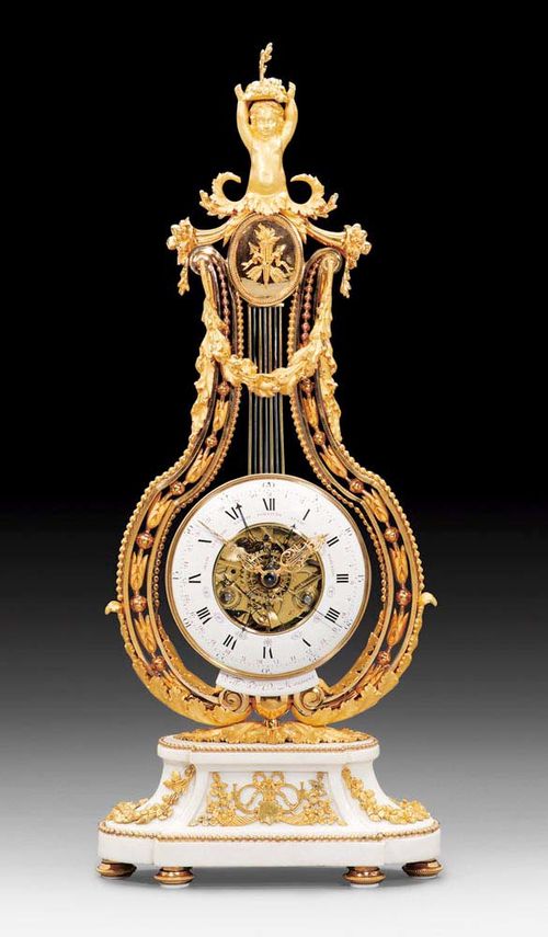 IMPORTANT SKELETON CLOCK,Louis XVI, the dial signed. VALLE HGER DE MONSIEUR (active circa1760/80), Paris circa 1770/80. Matte and polished gilt bronze and "marbre statuaire". The lyre-shaped clock case with putto over medallion. The clock with exceptionally fine enamel chapter ring with hours, minutes, days of the month and of the week, with 6 hands. A very fine skeleton movement with 4/4 striking on 2 bells. With gilt bronze applications in the form of cornucopias, musical instruments, bows, garlands, flowers and beading. Some parts with mark "G". 29x13x70 cm. Provenance: private collection, Zurich.