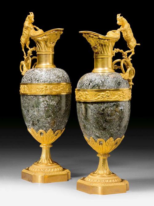 PAIR OF IMPORTANT TWO-HANDLED JUGS "AU BOUC",late Louis XVI, stamped H. DASSON (Henri Dasson, 1825-1896), Paris circa 1860/80. Matte and polished gilt bronze and grey/white granite. H 65 cm. Provenance: from an English collection.
