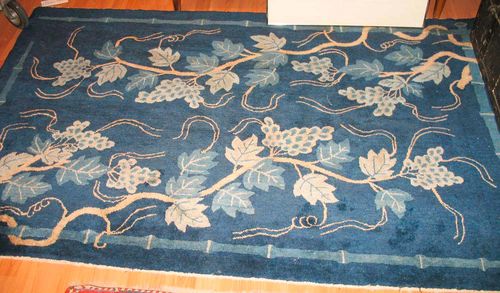 CHINA antique. Blue central field, decorated with two vine tendrils in beige and light blue, good condition, 200x125 cm.