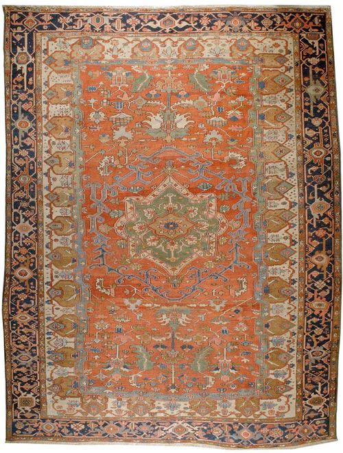HERIZ SERAPI antique.Green central medallion on a red and white ground, geometrically patterned with stylized plant motifs in attractive colours, blue border, good condition, 416x300 cm.