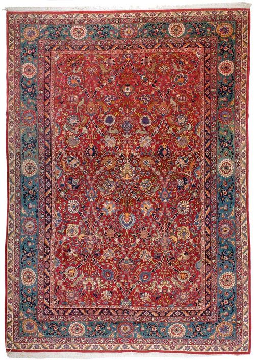 ISFAHAN old.Violet central field, patterned throughout with colourful trailing flowers and animals, green border, slight wear, 305x215 cm.