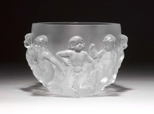 LALIQUE,pressed glass. Bowl decorated with 8 putti. Signed "Lalique France", D 26.5 cm, H 21 cm.