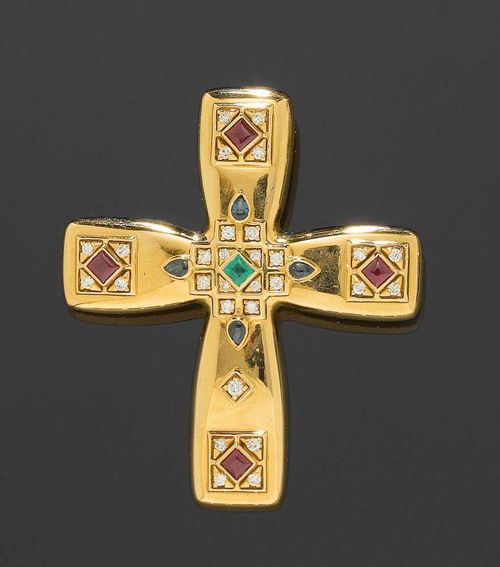 GOLD AND GEMSTONE PENDANT/BROOCH, CARTIER 1993. Yellow gold 750. Ref. B3001400, "Byzantine GM" model. Decorative cross, the centre and ends of the cross beams decorated with appliqued ornaments, set with 4 small carré-cut rubies, 3 sapphire droplets, 1 carré-cut emerald totalling 1.50 ct and 28 brilliant-cut diamonds totalling 0.41 ct. Foldable eyelet, clip brooch. Back signed, dated and numbered D61818. With case and copy of certificate from Cartier.