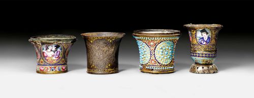 A GROUP OF FOUR GHALIAN CUP PARTS. Persia, Qajar, 19th c., heights 6-8 cm. a) and b) Polychrome enamelled with gold details showing four medallions of figures and birds. c) Turquoise and red stones inlaid on gold and dark blue ground. d) Bronze, engraved with figurative and floral decor within a gold border. Slightly damaged. (4)