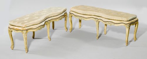 PAIR OF PAINTED BENCHES,Baroque, Venice. Wood, carved with flowers and painted yellow/green. Rectangular, padded seat, curved legs. Upholstered cushion with green silk cover (to be replaced). 117x40x45 cm. Requires some restoration.