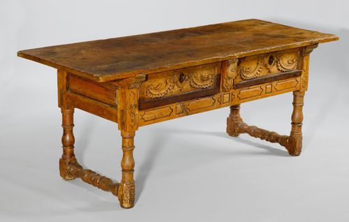 REFECTORY TABLE,Baroque, Italy or Spain, 18th century. Walnut, carved with rocailles, a head and reserves. Rectangular leaf with turned legs, and 2 drawers. 188x74x77 cm. Altered, requires restoration.