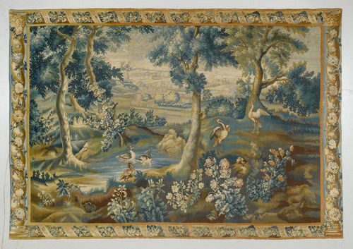 TAPESTRY,France, 18th century. Depiction of an idealized landscape with a pond and aquatic birds, with a village in the background. Border with leaf garlands and twisted pillars. 260x385 cm. Shortened.