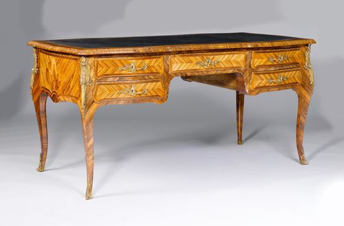 BUREAU PLAT,in the style of Louis XV, France. Tulipwood and purpleheart, in veneer. Rectangular top with dark leather lining. Curved legs. Front with 5 drawers. Bronze mounts. Locks, not original. 162x80x79 cm. 2 keys. Provenance: - from a private collection, Geneva.
