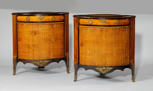PAIR OF HALF-HEIGHT CORNER CABINETS,Victorian, England, 19th century. Inscribed "FROM W.WILLIAMSON AND SONS IN GUILFORD". Mahogany, rosewood, tulipwood and dark-stained wood, inlaid with rectangular reserves and fillets. Curved front with drawer and slatted closure. Curved legs. Bronze mounts. 76x53x84 cm. Requires some restoration.
