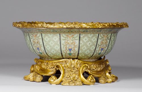 A LARGE BOWL WITH BRONZE MOUNTS,