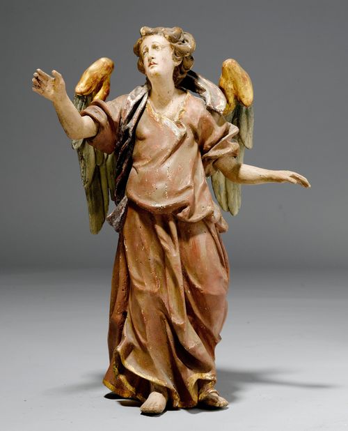 ANGEL,Baroque, Upper Austria, ca. 1680. Wood, carved and painted. The angel standing and looking towards the sky. H 55 cm. Paint reworked, arms later.
