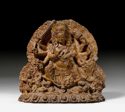 TERRACOTTA RELIEF.Nepal, 17th c. 23x 21cm Eight-armed wrathful deity, most likely Bhairava, trampling two defeated enemies. In his predominant hands he carries a chopper and skull cup. Two small dancing figures accompany him, one lion-headed, the other monkey-headed.