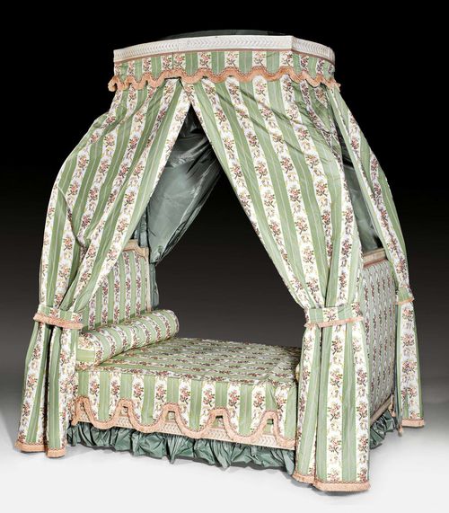 PAINTED CANOPY BED, Louis XVI, in the style of G. JACOB (Georges Jacob, maitre 1765), Paris circa 1770. Fluted and carved beech painted grey. Fein, green/grey striped silk cover with colorful flowers and foliage. With contents and pillows. L approx. 180 cm, W 130 cm. Provenance: -From a European private collection. Elegant canopy bed in a very good condition.