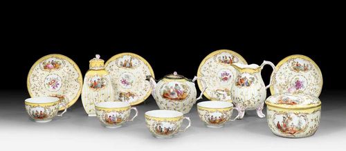 TEA SERVICE 'RELIEFZIERRAT MIT KARTUSCHEN', Berlin, KPM, circa 1765.Model by the Gotzkowsky factory'Neu Dessin, Reliefzierrat mit Kartuschen'. Each piece relief decorated with rocaille cartouches painted in gold with rustic scenes in the style of David Teniers on a yellow relief decorated ground. With gold border on yellow ground and gold edge. Comprising: 1 teapot with later restored silver mount on lid, 1 milk jug, 1 baluster-shaped tea caddy and lid and 4 cups and saucers. Underglaze blue sceptre marks. Impressed mark. The lid of the tea caddy and the handle of the milk jug glued. Provenance: private collection, Basel.