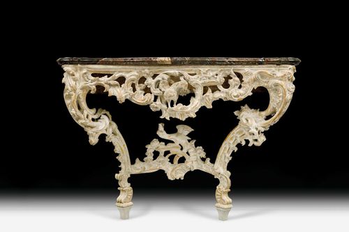 PAINTED CONSOLE "AU DRAGON", Louis XV, Germany/Austria, 18th century. Pierced and richly carved wooden console with dragon and flowers, painted in beige. Grey/red speckled, repaired marble top. 115x63x74 cm.